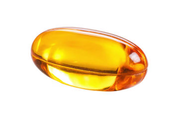 Close-up of a yellow softgel capsule isolated on white transparent background
