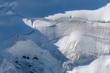 Impressive snow landscape in Alpine region under blue sky