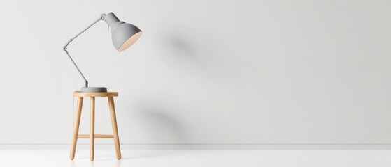 The modern lamp illuminating a minimalist wooden stool in a serene space.