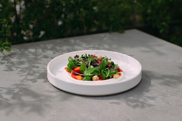 Fresh mixed salad with vegetables and nuts