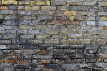 Old weathered brick wall background
