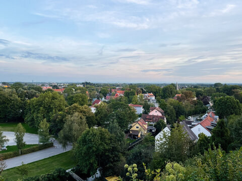 Panoramic view of a Dachau German town with colorful houses, green trees, and tranquil streets