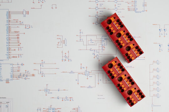 Red electrical connectors on circuit diagram
