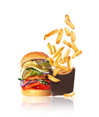 Traditional burger and baked potatoes close up isolated on a white background