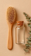 Wooden brush and oil bottle