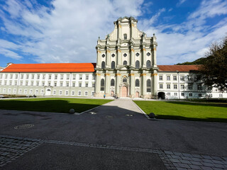 Historic Baroque church facade with adjoining wings in Furstenfeldbruck, German monastery complex, a grand landmark