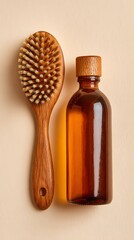 Wooden brush and oil bottle