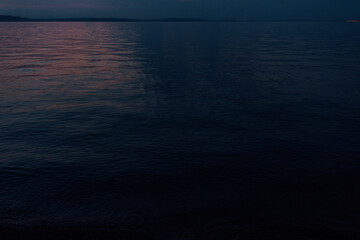 after dusk, blue and pink water, sea