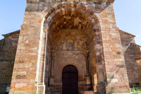 The grand Renaissance stone portal of the Parish Church of Saint Pelagius in Salinas de Pisuerga, Palencia, Spain