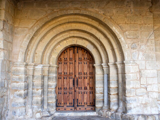 Fototapeta premium Romanesque portal of the Church of San Fructuoso in Valoria de Alcor, Palencia, Spainr