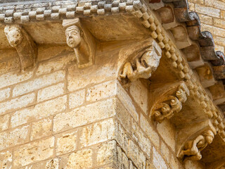Variety of carved Romanesque corbels on the Church of San Martin de Tours in Fromista, Spain