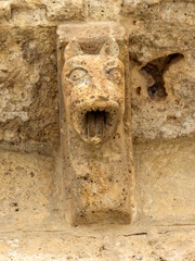 Romanesque stone corbel of a snarling monster at the Church of San Martin de Tours, Fromista, Spain