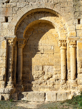 Romanesque blind arch on the wall of the Church of San Fructuoso in Valoria de Alcor, Palencia, Spain