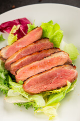 Duck breast roast poultry fresh natural product tasty snack delicious gourmet food background on the table rustic top view copy space