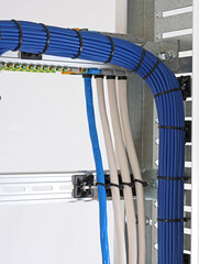 Installation of an electrical panel using nylon cable ties.