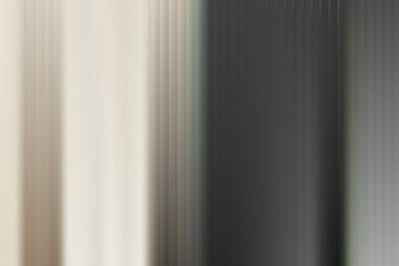 Obraz premium Abstract vertical lines create a modern and minimalist background, with a blend of neutral tones that evoke a sense of simplicity and sophistication