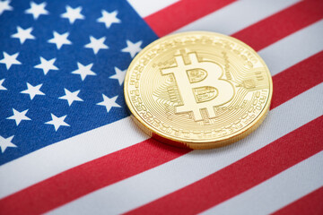 Bitcoin golden coin with american flag images.