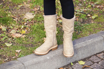 Female fashion - beige suede boots