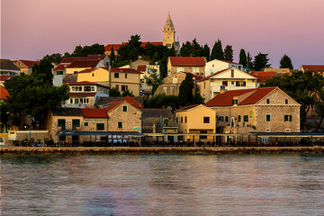 Obraz premium Croatia golden hour, Mediterranean city in the background, harbor in the foreground