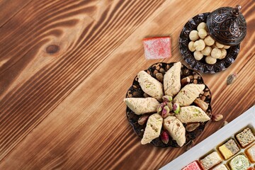 Traditional plate with sweet date fruits and tea