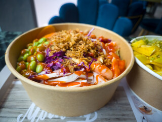 Colorful Poke Bowl Served on a Table with Fresh Ingredients