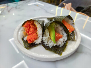 Japanese Temaki Hand Rolls on Marble Table
