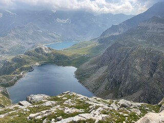 Panoramic view of the Nivolet Lakes, located in the Gran Paradiso National Park between Piedmont and Aosta Valley, Italy. The scene features two alpine lakes &mdash; Lago Serr&ugrave; and Lago Agnel
