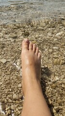 feet on the beach