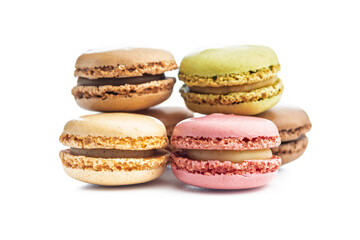 Different flavors of macarons. Colourful macaroons isolated on white background.