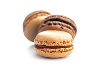 Different flavors of macarons. Colourful macaroons isolated on white background.
