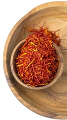 Fototapeta premium Saffron threads in wooden bowl
