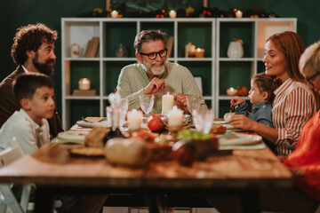 Family enjoying thanksgiving dinner together at home