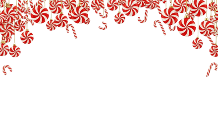 Festive christmas border of candy canes and peppermint swirl ornaments isolated on transparent background, creating a sweet and joyful holiday atmosphere
