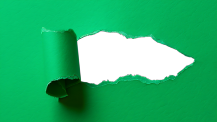 Torn green paper with black space inside