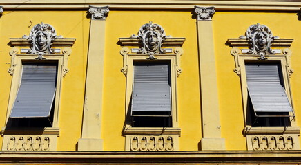 Three windows on the 19 century building in Zrenjanin.