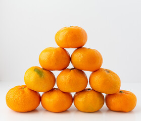 Pyramid of Tangerines on a White Background