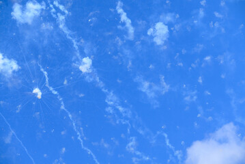 Daytime Fireworks Exploding in a Blue Sky The Concept of a Celebration