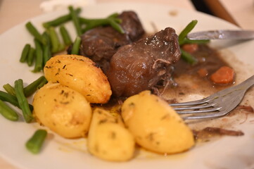 Traditional meal with boiled potatoes, meatballs and green beans, close-up food photo