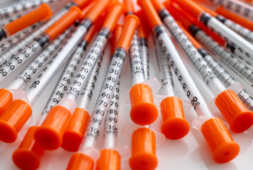 Close up of Many Single Use Insulin Syringes 31 Gauge 