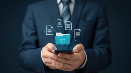 Businessman using a smartphone to transfer digital files. The image highlights modern business practices and the importance of technology