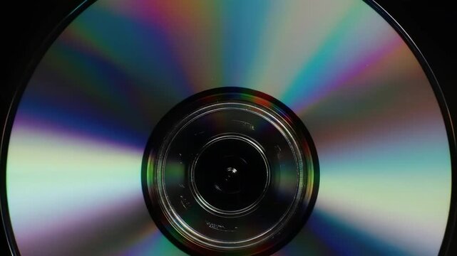 Abstract Rainbow Light Reflection on Spinning Optical Disc (CD/DVD) - Technology Background