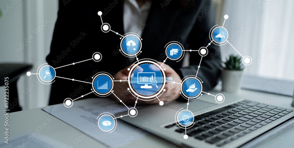 Aufkleber a business professional engages with digital analytics and data visualization on a mobile device whi