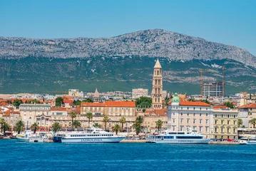 Fototapete Schiff SPLIT, CROATIA – July 16, 2019: Panoramic view of Split Riva with Diocletian's Palace, palm trees, and Jadrolinija ferries on a sunny summer day  © marinv