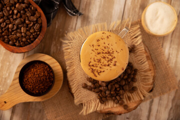 Dalgona Coffee, a cold, sweetened whipped beverage made with milk and frothy coffee cream made with instant coffee, a trendy, refreshing, and easy recipe.