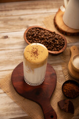 Dalgona Coffee, a cold, sweetened whipped beverage made with milk and frothy coffee cream made with instant coffee, a trendy, refreshing, and easy recipe.