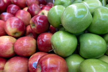 Red and Green Apples - A vibrant photo featuring a mix of red and green apples. The image highlights the freshness, natural color, and texture of the fruit, making it ideal for use in food photography