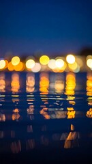 Night lights reflected on water
