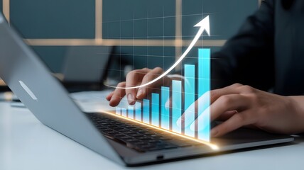Business growth and success with rising financial chart on laptop screen