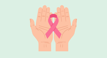 Obraz premium Hands holding pink ribbon for breast cancer awareness support