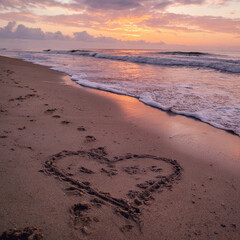 Heart Inscribed into Golden Wet Sand with Thin Grooves and Minimalist Style &ndash; great for romantic banners  